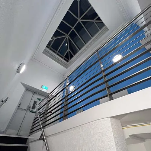 Emergency and stairwell lighting inspected during a commercial EICR