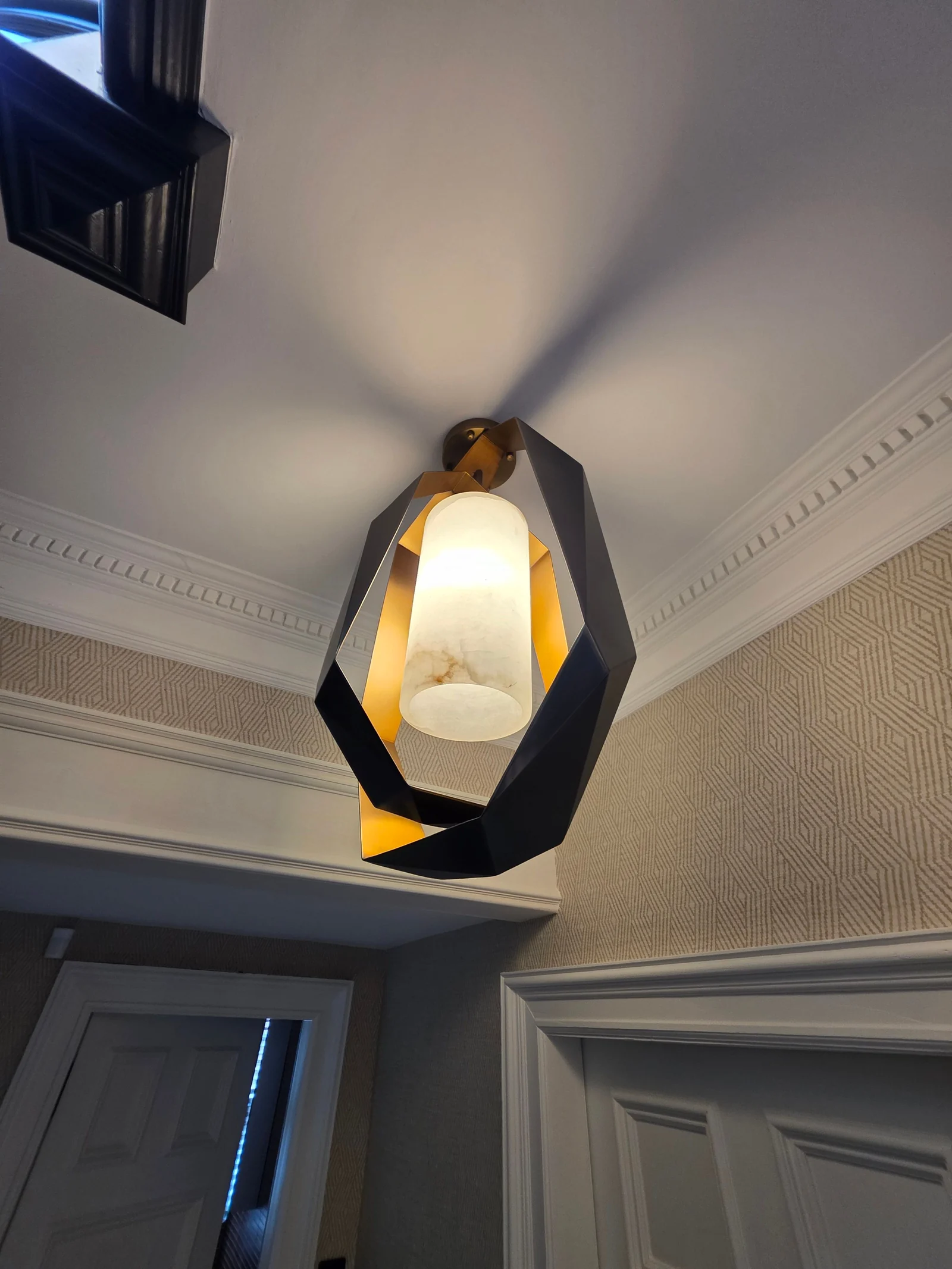 Faceted pendant light fitted in an Edinburgh period property by Spartan Electrical
